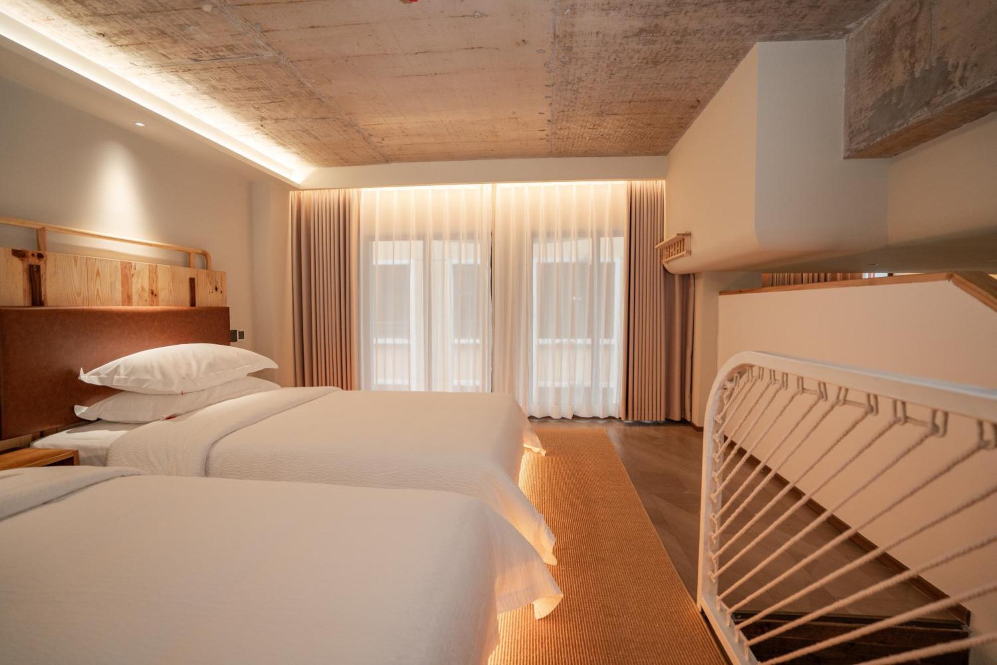 Patio Spring Holiday Inn -- Free Round Trip Pick-Up Service --Panoramic View Of Tianmen Mount Чжанцзяцзе Номер фото