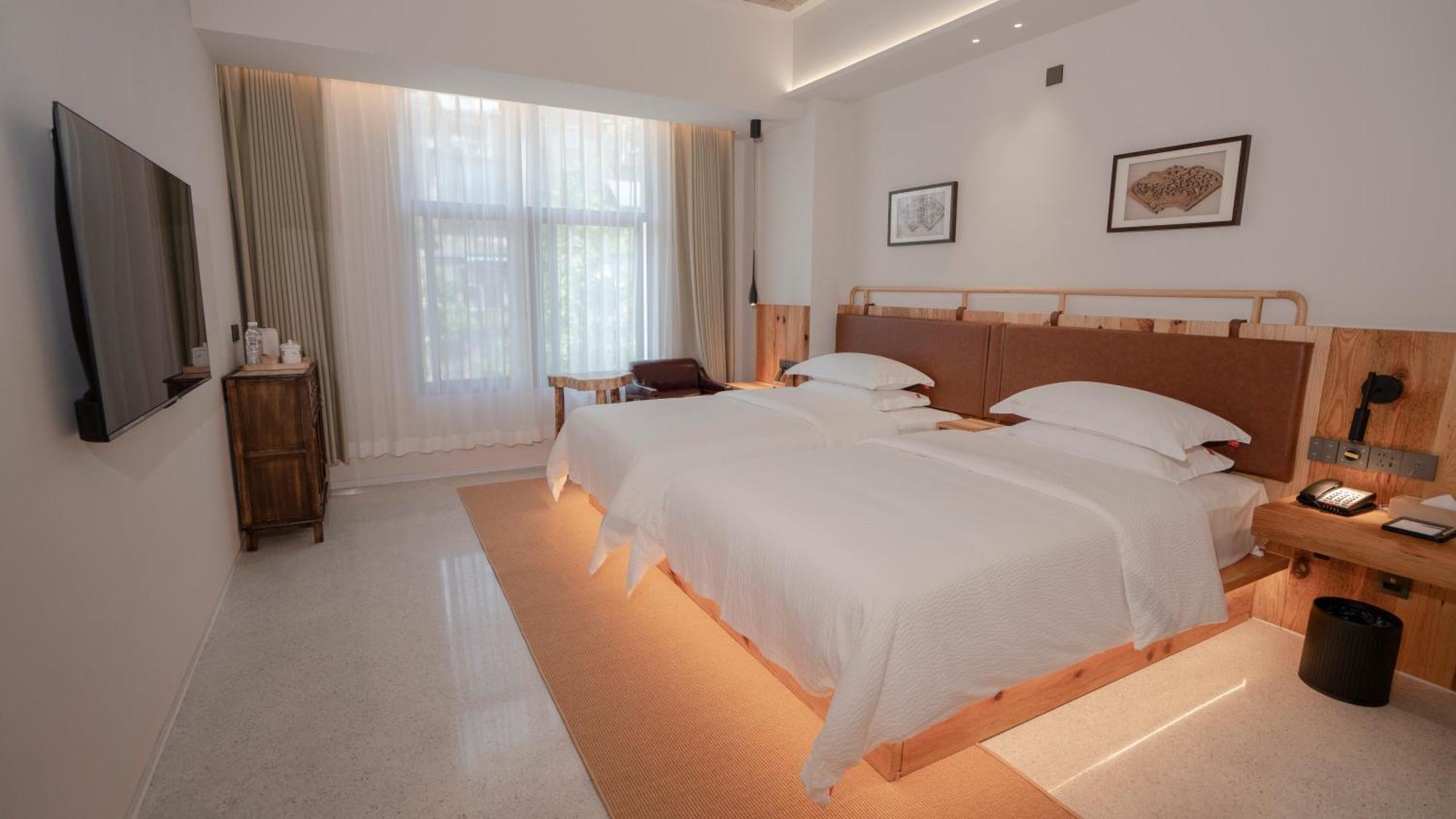 Patio Spring Holiday Inn -- Free Round Trip Pick-Up Service --Panoramic View Of Tianmen Mount Чжанцзяцзе Экстерьер фото