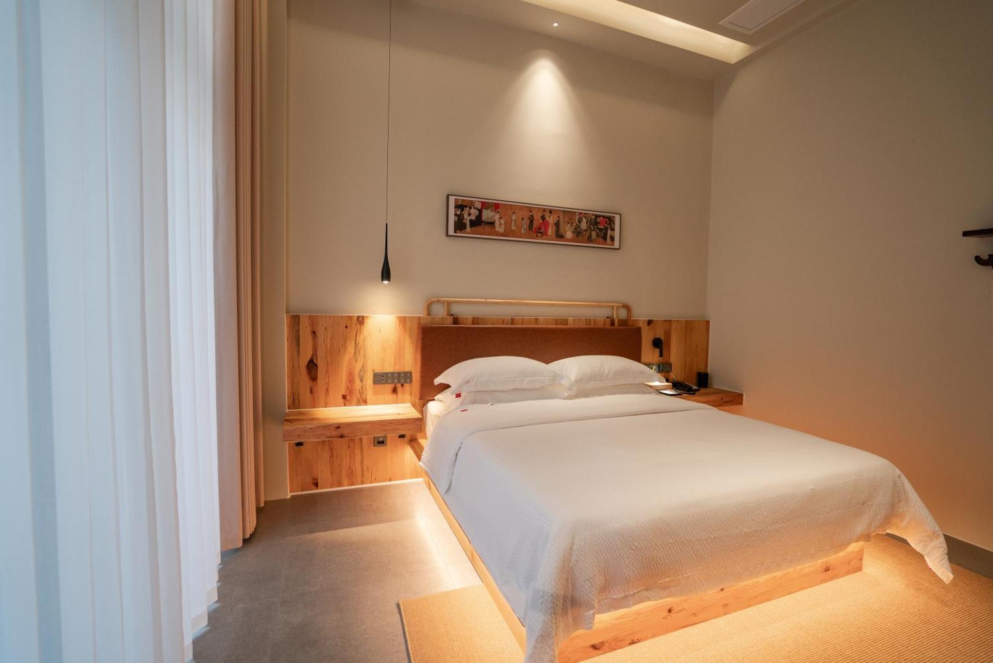 Patio Spring Holiday Inn -- Free Round Trip Pick-Up Service --Panoramic View Of Tianmen Mount Чжанцзяцзе Экстерьер фото