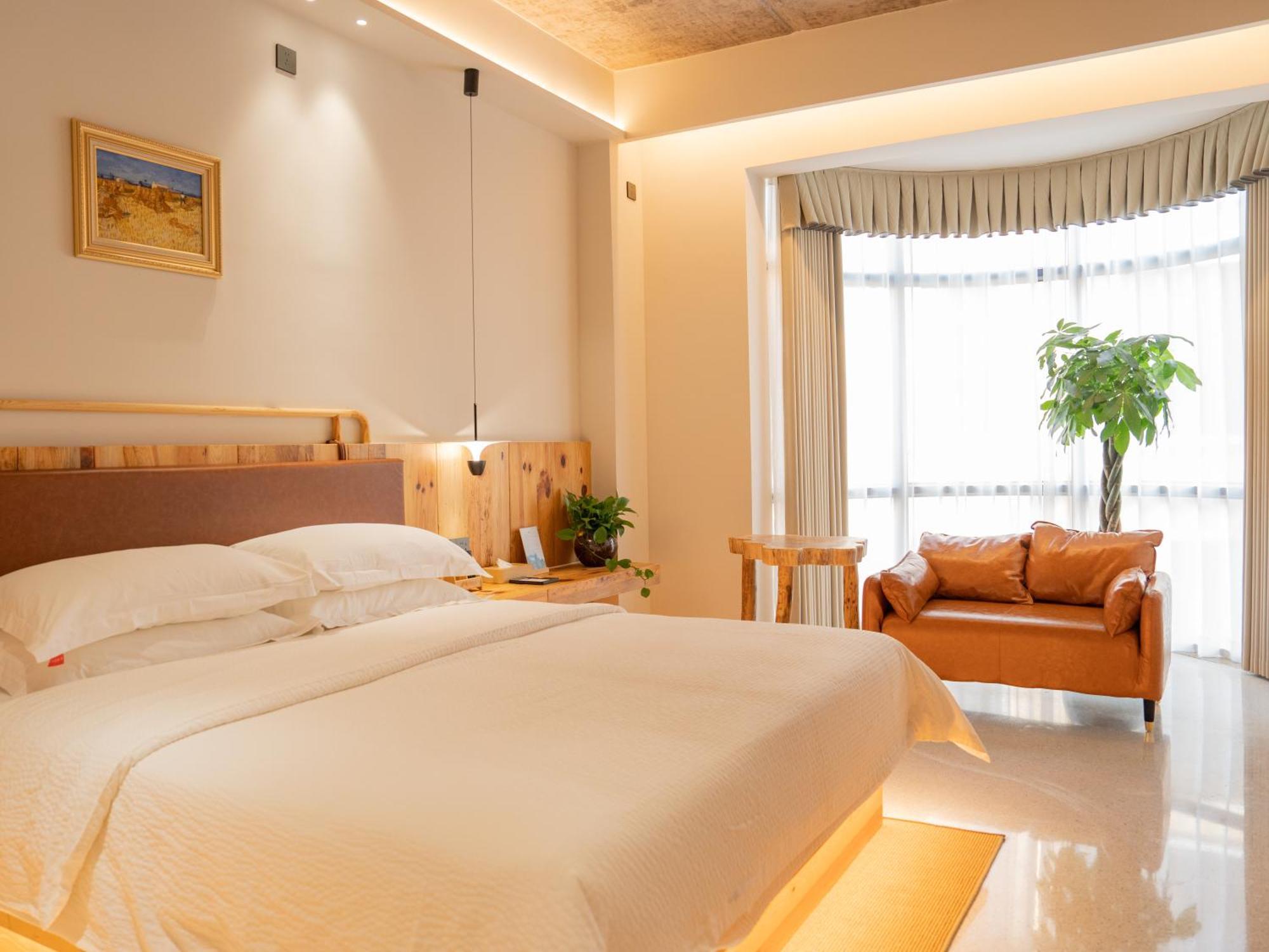 Patio Spring Holiday Inn -- Free Round Trip Pick-Up Service --Panoramic View Of Tianmen Mount Чжанцзяцзе Экстерьер фото